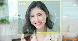 emotion detected by artificial intelligence AI system concept - Young asian businesswoman makes happy facial expressions on her face