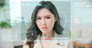 emotion detected by artificial intelligence AI system concept -  Young asian businesswoman makes angery facial expressions on her face