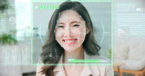 emotion detected by artificial intelligence AI system concept - Young asian businesswoman makes excited facial expressions on her face